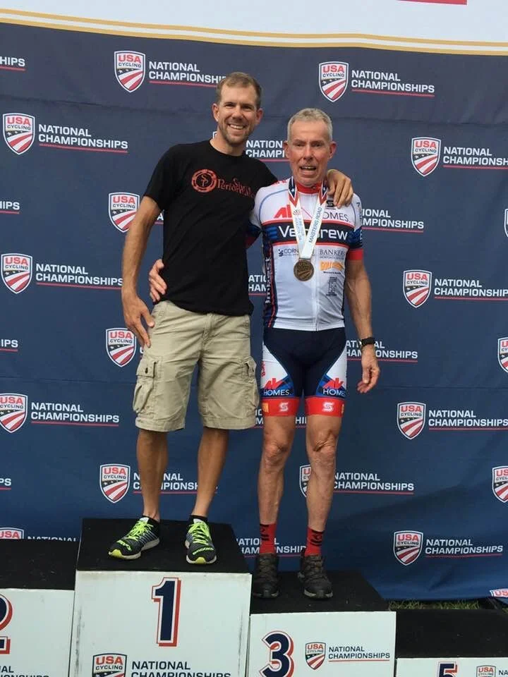 An SP athlete standing on the number-one spot of the podium at the USA Cycling National Championships