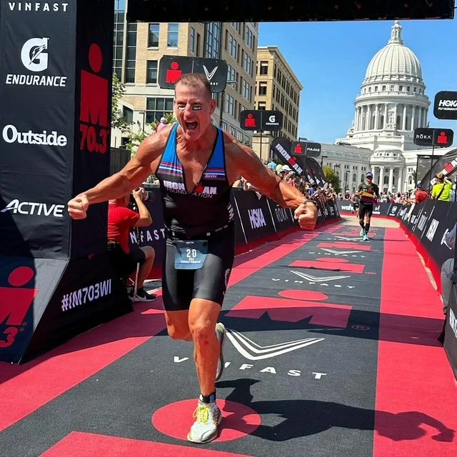 An athlete approaching the IRONMAN Jacksonville finish chute